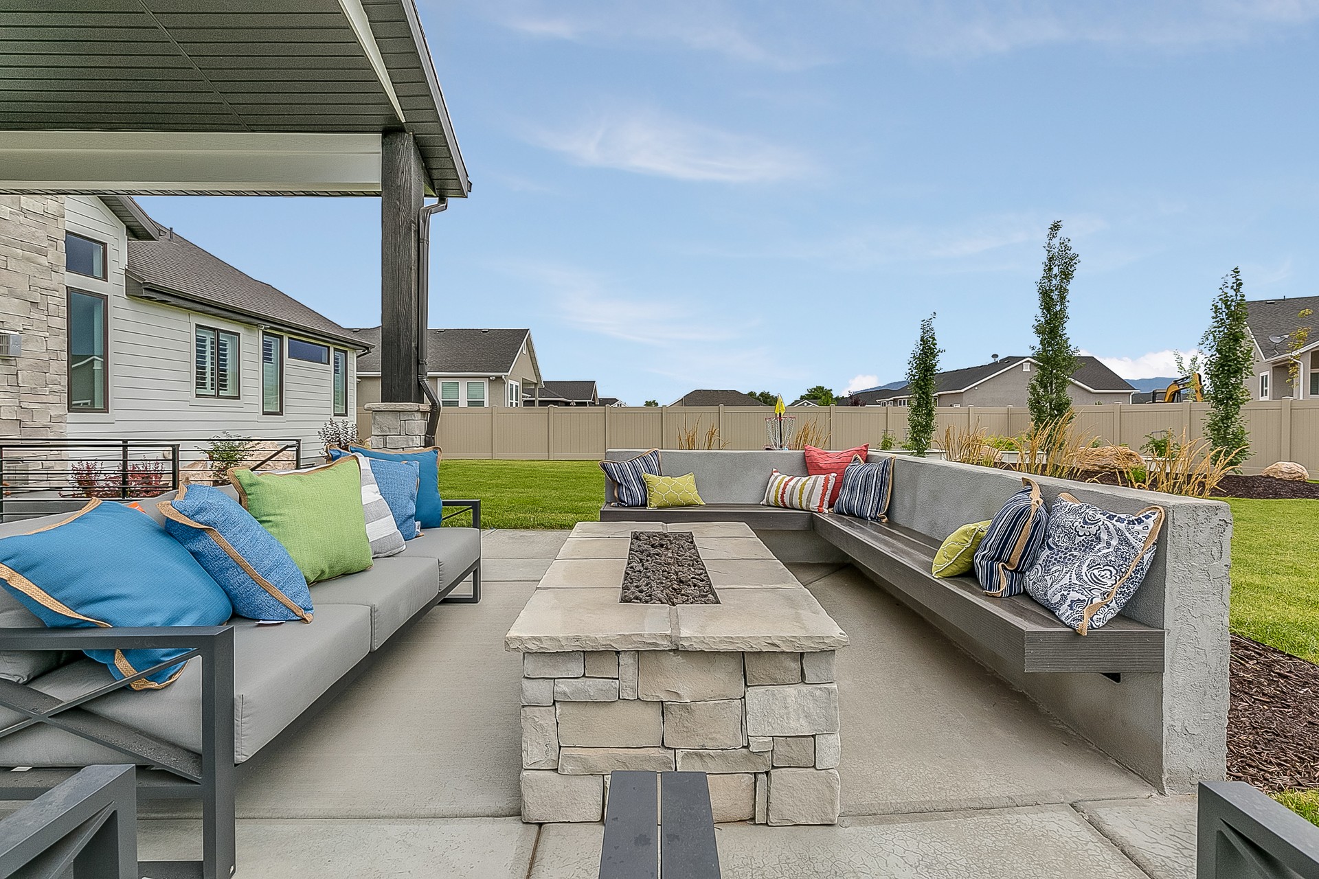 Fire pit and wonderful seating in newly constructed back patio